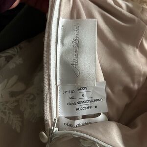 Selling my Allure Bridals wedding dress - never used and brand new. Not altered